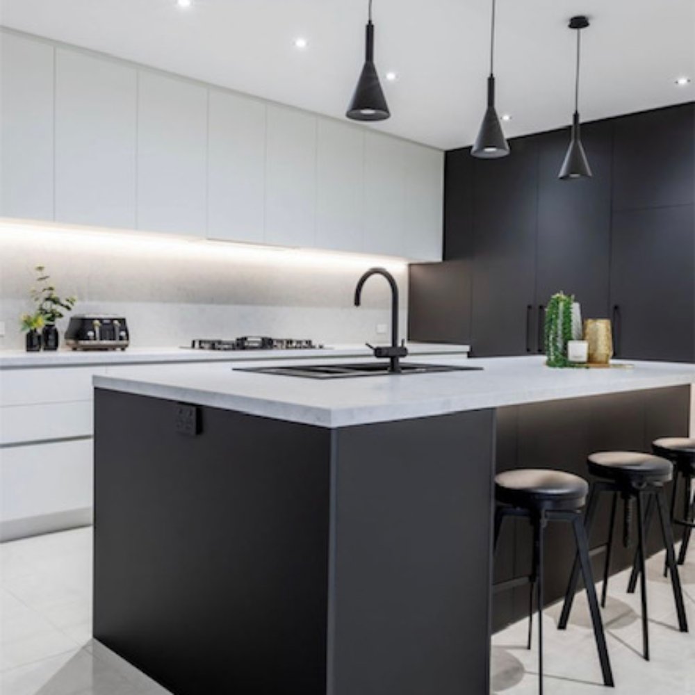 The fully renovated kitchen with modern appliances