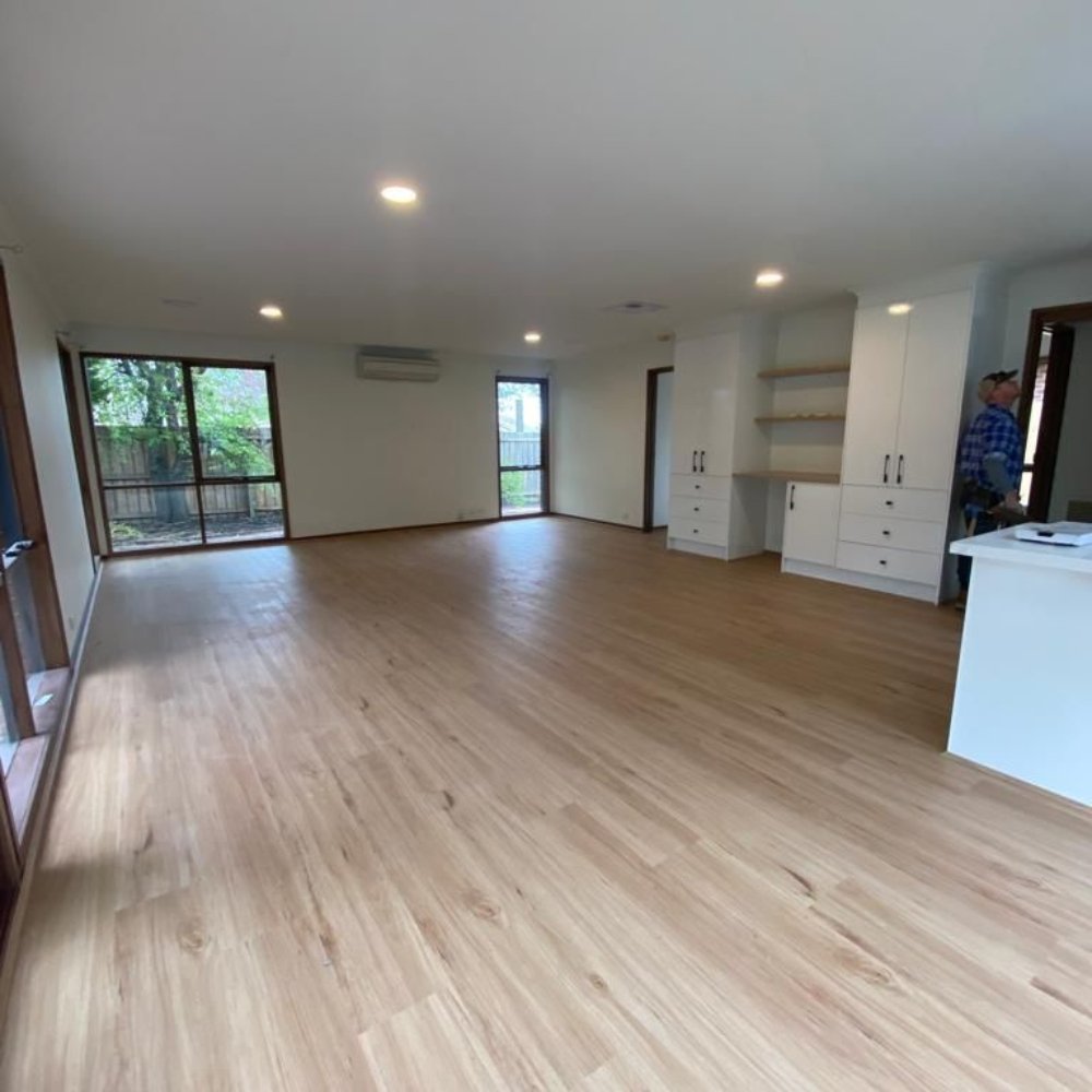 Renovated living area with fresh paint and elegant furnishings